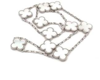 "This stunning Vintage Alhambra necklace by Van Cleef & Arpels features an exquisite design crafted in solid 18K white gold. Adorned with ten luminous Mother of Pearl motifs, this piece reflects the Maison's signature elegance and charm. The soft iridescent tones of the mother of pearl are elegantly complemented by the cool white gold, making it a versatile accessory for any occasion. Authenticated and presented in its original box, this elegant necklace is an exceptional addition for jewelry collectors and lovers alike.

Victorins Auctions will coordinate all domestic and international shipping. Please allow approximately 10–15 business days for processing. Certain items may require additional handling time depending on their location, origin, or special packaging requirements. By registering for or placing a bid in a Victorins auction, you confirm that you have reviewed, understood, and agreed to our Shipping, Payment, and Auction Policies."
