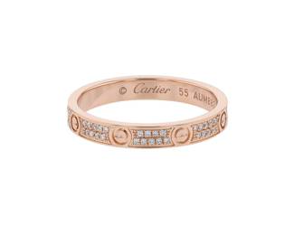 "This exquisite Cartier Love PM diamond ring is a luxurious piece crafted in 18k rose gold. The ring features stunning diamond accents totaling 0.19 carats, elegantly set within a polished band. Measuring 0.26 cm in width, this modern design is both timeless and iconic, making it a perfect representation of love and commitment. With a weight of 3.1 grams and a size of 55, this ring offers a statement of sophistication that is unmistakably Cartier.

Victorins Auctions will coordinate all domestic and international shipping. Please allow approximately 10–15 business days for processing. Certain items may require additional handling time depending on their location, origin, or special packaging requirements. By registering for or placing a bid in a Victorins auction, you confirm that you have reviewed, understood, and agreed to our Shipping, Payment, and Auction Policies."
