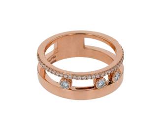 "This exquisite Messika Move Romane ring features a stunning blend of modern design and luxurious materials. Crafted from 18k rose gold, this ring showcases a unique open design adorned with sparkling diamonds. The central element includes three larger diamonds, while smaller diamonds elegantly accent the band. With a total diamond weight of 0.3 carats, this piece is ideal for those who appreciate fine jewelry. The ring size is 53, making it a beautiful gift or a delightful addition to any jewelry collection.

Victorins Auctions will coordinate all domestic and international shipping. Please allow approximately 10–15 business days for processing. Certain items may require additional handling time depending on their location, origin, or special packaging requirements. By registering for or placing a bid in a Victorins auction, you confirm that you have reviewed, understood, and agreed to our Shipping, Payment, and Auction Policies."
