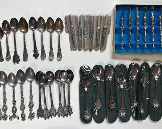 Vintage Silver Plate Collector's Spoons, Horderves Forks & More (Over 40 Pieces)
Lot #: 110
