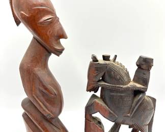 2 Vintage African Hand Carved Solid Wood Figurines
Lot #: 51