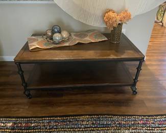 Great industrial style coffee table on casters 