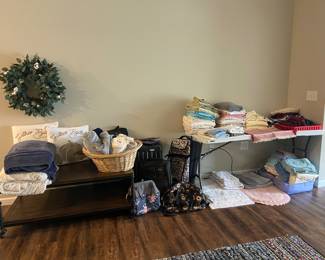 Nice assortment of clean linens and rugs 