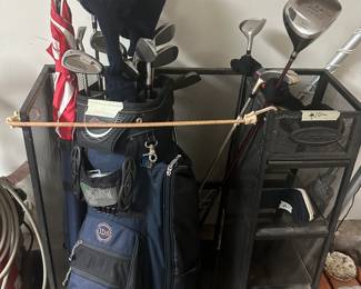Wilson set of golf clubs in bag and some separate ones (garage)