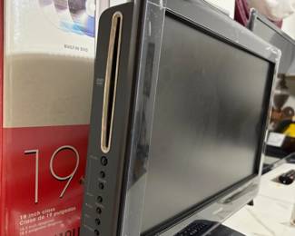 19" TOSHIBA TV WITH BUILT-IN DVD PLAYER.