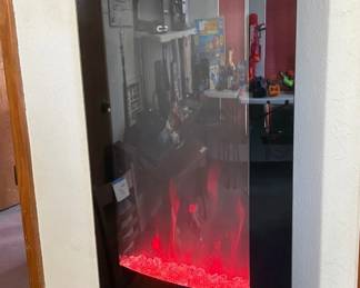 WONDERFUL REMOTE CONTROL WALL HEATER THAT YOU CAN CHANGE THE FLAME COLOR.