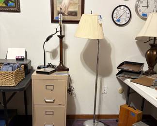 TWO DRAWER FILING CABINET, FLOOR LAMP, CLOCKS AND MORE.