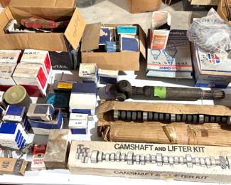 NEW IN BOX CAMSHAFTS AND CAM AND LIFTER SETS, POINTS, PLUGS, COILS, DISTRIBUTERS YOU NAME IT.