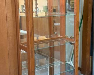 LIGHTED CURIO CABINET.
