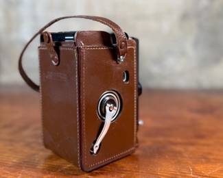 The lot features a Rollei Magic twin-lens reflex (TLR) camera. This vintage medium format camera was produced by the German company Franke & Heidecke between 1960 and 1962. It uses 120 film and produces 6×6 cm images. The camera features a 75mm f/3.5 Schneider Xenar taking lens and a 75mm f/3.5 Heidosmat viewing lens. A key feature of the Rollei Magic is its automatic exposure system, which relies on a built-in selenium light meter. The camera’s design is based on the Rolleicord series and was an early attempt at an automatic camera in the medium format market. Tested and in good working condition.
