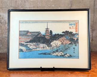 "Kinryūzan Temple at Asakusa", a famous Japanese ukiyo-e woodblock print by listed artist, Utagawa Hiroshige. In a period frame, this piece is in excellent condition, dated 1931 on the verso and measures in frame, 13.75” H x 18.5” W. The print depicts a scene from the Edo period (17th to 19th centuries) of the Kinryūsan Sensōji, a popular Buddhist temple in Asakusa, Edo (modern-day Tokyo).
