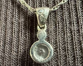 This lot features a stunning necklace and pendant by Judith Jack with a total approx. weight of 3.00 grams and measures, 17”. Marked on pendant and clasp as shown in photos. Judith and Jack Rosenberg founded the jewelry maker in 1969. In 2001, the company was sold to the Jones Group and hasn’t been an active brand since. During its heyday, Judith Jack was best known for its sterling silver marcasite jewelry inspired by the Art Deco and Art Nouveau styles.
