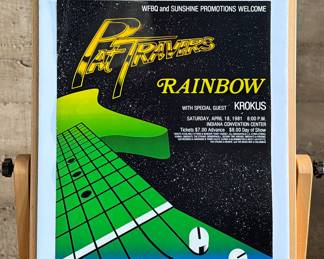 This lot features a concert poster for a show featuring the rock bands Pat Travers and Rainbow, with special guest Krokus. The concert took place on Saturday, April 18, 1981, at the Indiana Convention Center. Rainbow is a British rock band formed by former Deep Purple guitarist Ritchie Blackmore. This poster measures, 22.5” H x 17” W.
