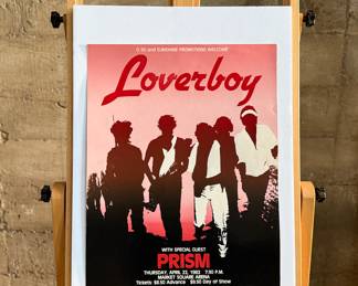 This lot features an original concert poster for the rock band Loverboy with special guest, Prism at the Market Square Arena circa 1982. This poster measures, 22.5” H x 17” W. Loverboy was a popular Canadian quintet in the 1980s, known for multi-platinum albums and hit singles like "The Kid Is Hot Tonight" and "Working for the Weekend".
