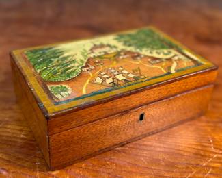 This lot features an antique wooden homeopathic apothecary box used to store various vials of homeopathic remedies. This box measures, 2.75” H x 7.75” W x 5” D.

