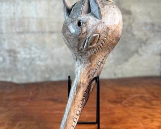 This lot features what appears to be an African Guro "Jackal" mask from the Ivory Coast that measures, 13” H x 6.5” W x 4” D.
