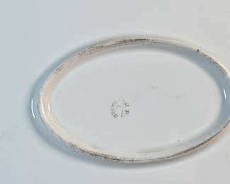 This lot features an antique Limoges porcelain plate with a hand-painted scene. Marker mark underneath as shown in photos and measures, 13.25” H x 18.5” W. 
