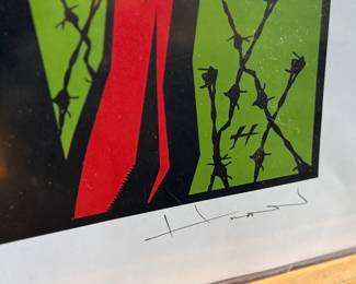 This lot features a concert poster for Michael Franti & Spearhead, designed and signed by artist, Justin Hampton. Limited edition, numbered 94/150 and measures, 25.5” H x 17.5” W. The concert was presented by the House of Blues and took place at the Paramount Theatre in Seattle. 
