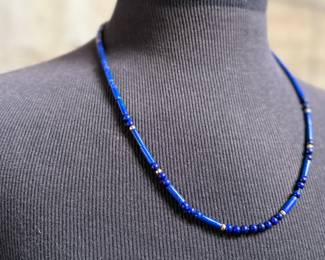 This lot features a stunning necklace & bracelet set, made with 14k gold and lapis. The necklace measures 24” and the bracelet 7”. Total approx. weight of 30.00 grams.
