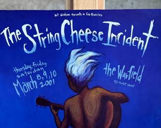 This lot features an original concert poster for The String Cheese Incident at The Warfield in San Francisco circa 2001. Promoted by Bill Graham, this poster measures, 19” H x 13” W.
