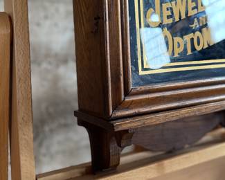 This lot features an antique clock made by the Waterbury Clock Company, with an advertising glass panel for Macdonald Jewelry Company. Appears complete with key, pendulum, instructions, and service records. This clock measures, 35” H x 16” W x 5” D. The Waterbury Clock Company factory is a historic complex of factory buildings in Waterbury, Connecticut. Development began in 1873, with the extensive plant serving as the company’s main manufacturing facility and headquarters until 1944.

