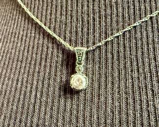 This lot features a stunning necklace and pendant by Judith Jack with a total approx. weight of 3.00 grams and measures, 17”. Marked on pendant and clasp as shown in photos. Judith and Jack Rosenberg founded the jewelry maker in 1969. In 2001, the company was sold to the Jones Group and hasn’t been an active brand since. During its heyday, Judith Jack was best known for its sterling silver marcasite jewelry inspired by the Art Deco and Art Nouveau styles.
