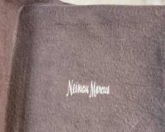 This lot features a stunning set of flatware by Christofle for Neiman Marcus. Each piece is beautifully marked as shown in photos, accompanied with Neiman Marcus covers, and housed in a vintage flatware box for safe storage. Christofle was founded in Paris in 1830 by Charles Christofle, who gained a reputation for his innovative silver plating technology and became a purveyor to the French court. The company grew significantly, supplying its flatware to royalty and even making its mark at international exhibitions, earning awards until at least 1937. Key moments in its history include acquiring the patents for electroplating in 1842, creating the America flatware collection in 1933, and introducing the Aria collection in 1985. 
This set includes two (2) large spoons, one (1) server, one (1) large fork, three (3) knives, twelve (12) big spoons, twelves (12) big forks, twelve (12) standard spoons, and eight (8) standard forks.