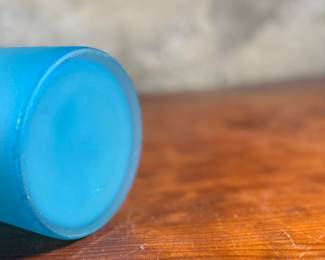 This lot features a vintage French blue opaline glass lidded keepsake box with brass trim that measures, 5” H x 4.75” W x 4.75” D. One small interior crack as shown in photos.
