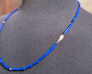 This lot features a stunning necklace & bracelet set, made with 14k gold and lapis. The necklace measures 24” and the bracelet 7”. Total approx. weight of 30.00 grams.
