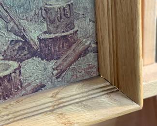 "The Scoutmaster", a vintage print on canvas by listed artist, Norman Rockwell. Professionally framed, this piece was painted in 1956 and depicts a Scoutmaster standing by a campfire at night, with four scouts asleep in tents in the background. This piece measures in frame, 18.5” H x 16” W. Rockwell created the painting as a tribute to American Scoutmasters, capturing a moment of quiet leadership and service.
