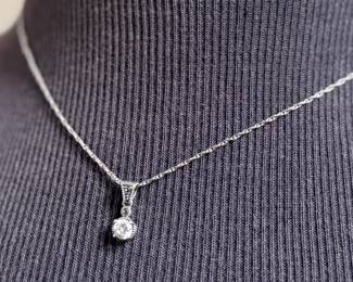 This lot features a stunning necklace and pendant by Judith Jack with a total approx. weight of 3.00 grams and measures, 17”. Marked on pendant and clasp as shown in photos. Judith and Jack Rosenberg founded the jewelry maker in 1969. In 2001, the company was sold to the Jones Group and hasn’t been an active brand since. During its heyday, Judith Jack was best known for its sterling silver marcasite jewelry inspired by the Art Deco and Art Nouveau styles.
