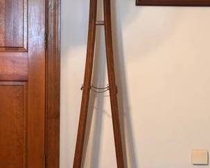 Mission style wooden coat rack with brass duck hooks