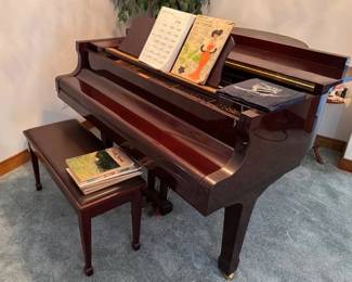 Yamaha baby grand piano and music