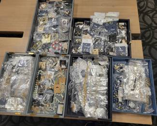Hundreds of new pieces of costume jewelry. 