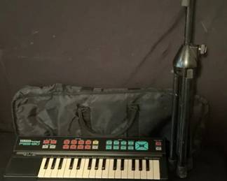 Yamaha Keyboard And Shure Microphone