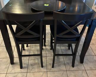 High top table: 6 chairs, hidden drop leaf and lazy Susan $350.00