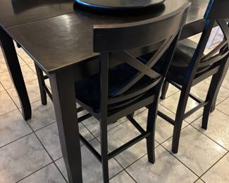 High top table: 6 chairs, hidden drop leaf and lazy Susan $350.00