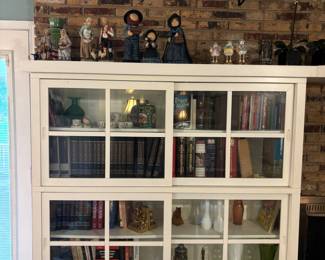 (2) White Bookcase curios with sliding glass doors. $ 250.00 each
81.25”w 14”- 15.5” d base 56”t