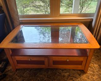 Wood Coffee Table w smoke glass top 2 drawers.  $ 180.00
48”L 30”d 20”t
