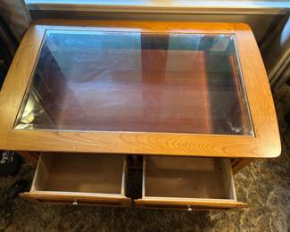 Wood Coffee Table w smoke glass top 2 drawers.  $ 180.00
48”L 30”d 20”t