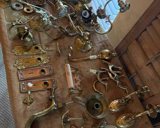 Brass sconces and hardware. Brass hooks.