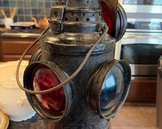Antique Philadelphia & Reading Railway railroad lantern with cast iron body, red signal globe, and Dresel burner (Arlington, NJ). Late 19th to early 20th century rail line lighting