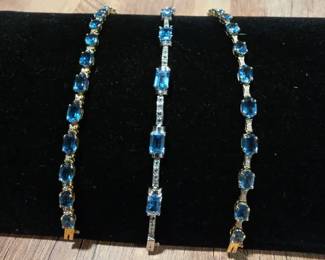 Three 14kt Gold Bracelets with Blue Topaz and Crystal Stone Accents