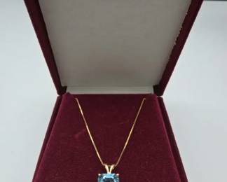 14kt Yellow Gold Chain With Emerald Cut Blue Topaz