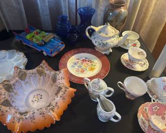 teapots, cups sugars creamers 