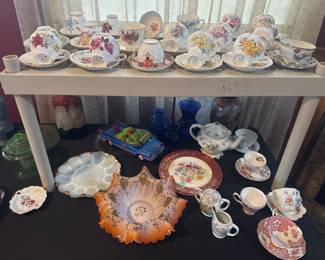 loads of porcelain tea cups 