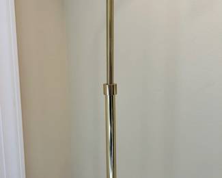 W60 - $50. Brass floor lamp. Adjustable height. Tallest 58" tall. Good condition. Some scuffs and a couple dents on the base.