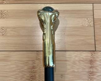 W28 - $30. "Bridges" Eagle Claw Cane with black aluminum shaft. 