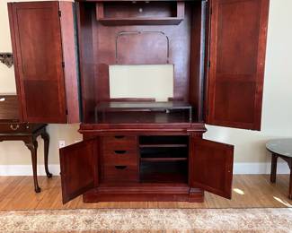 W14 - $50. Large 2 Piece Media Armoire. Measures 47" wide x 26" deep x 80" tall. Base does have some scratches. Moves in 2 pieces! Top & Bottom making it easier to maneuver!
