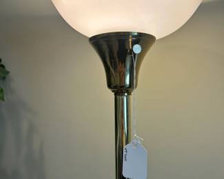 W55 - $20. Floor lamp with brass looking base and plastic shade. Measures 69" tall. 